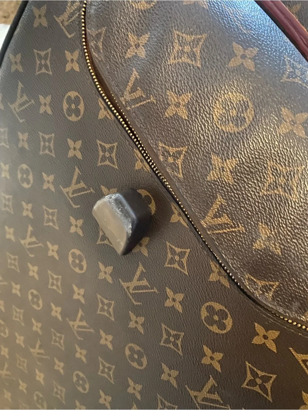 Louis Vuitton Monogram Canvas rolling Travel Bag with Natural Vachetta Trim